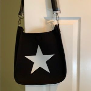 Ahdorned neoprene messenger bag w/white star.